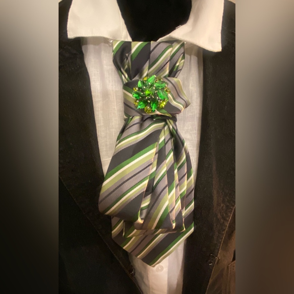Striped Tie with Green Brooch